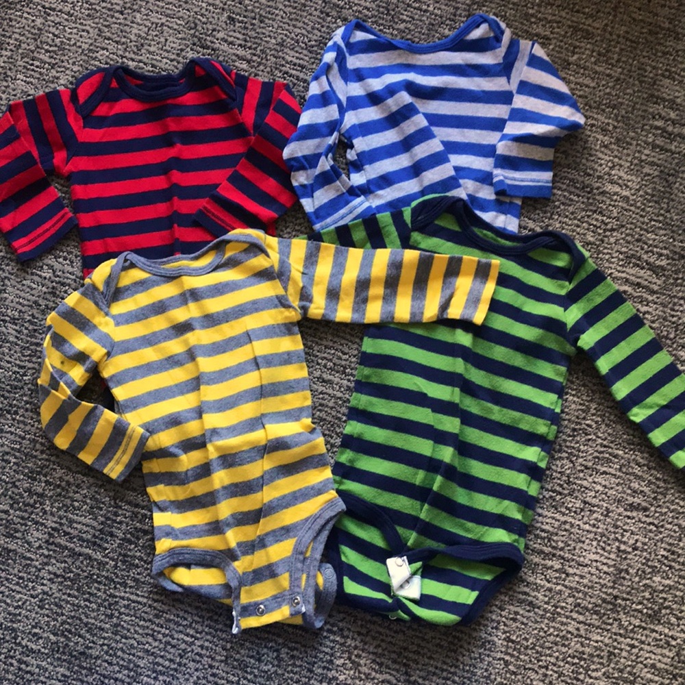 4 pack Carter’s long sleeve onesie. 12months